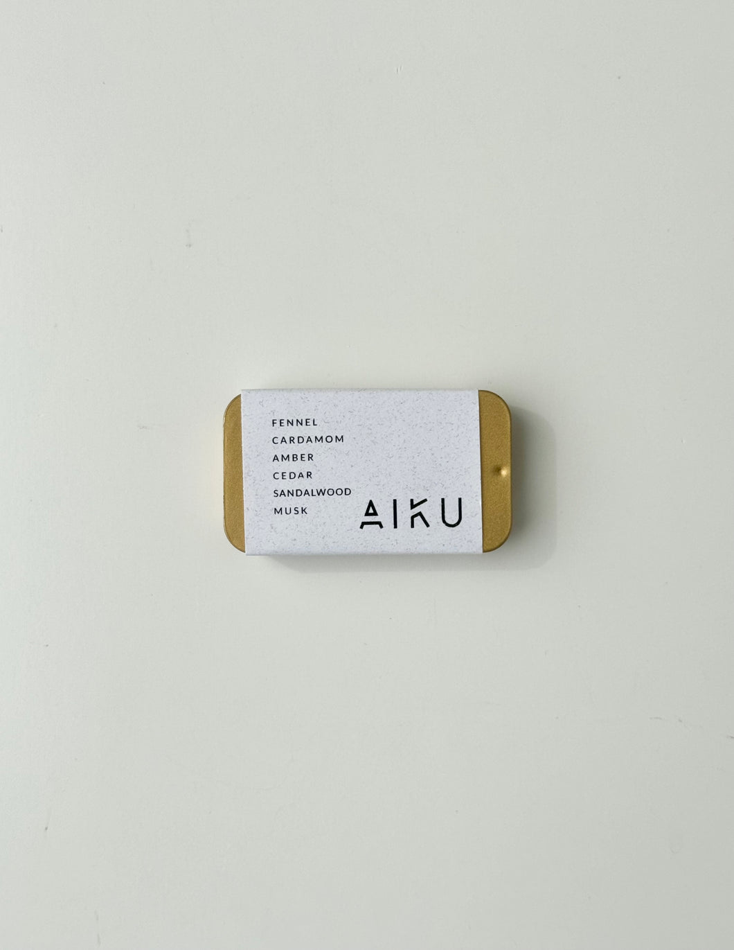 fine fragrance pocket scent - aiku - gold ember