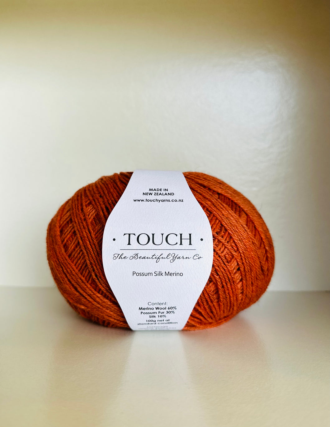 possum yarn burnt orange